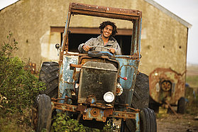 Boujamatest drives a local farmyard vehicle