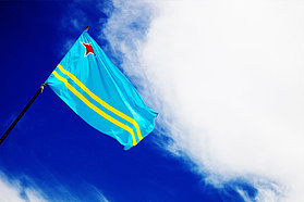 The Aruba flag flies proud