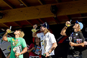 The winners taste the wine