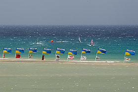 The Fuerteventura flags fly in the wind