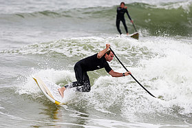 Robby Naish takes a North Sea wave
