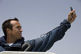 Race Director Juan Aragon checks the wind