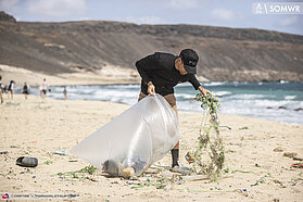 Antoine Martin clearing trash