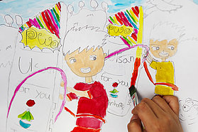 Local children paint windsurfing