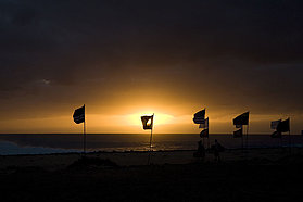 Flags at sunset